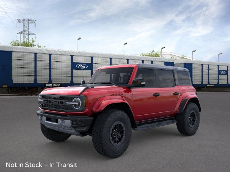 2025 Ford Bronco Raptor in Ruby Red Metallic Tinted Clearcoat — front three-quarter view