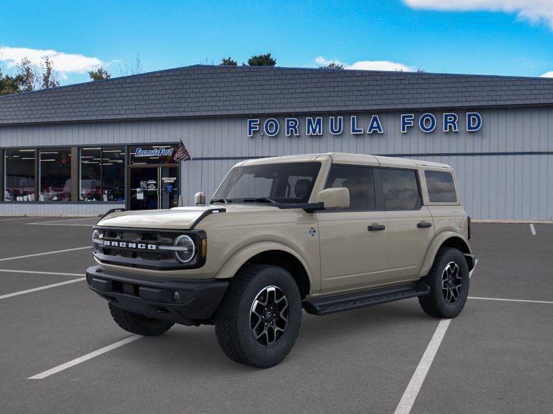 2026 Ford Bronco Outer Banks in Desert Sand — front three-quarter view